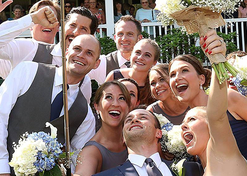 Wedding guests posing for selfie